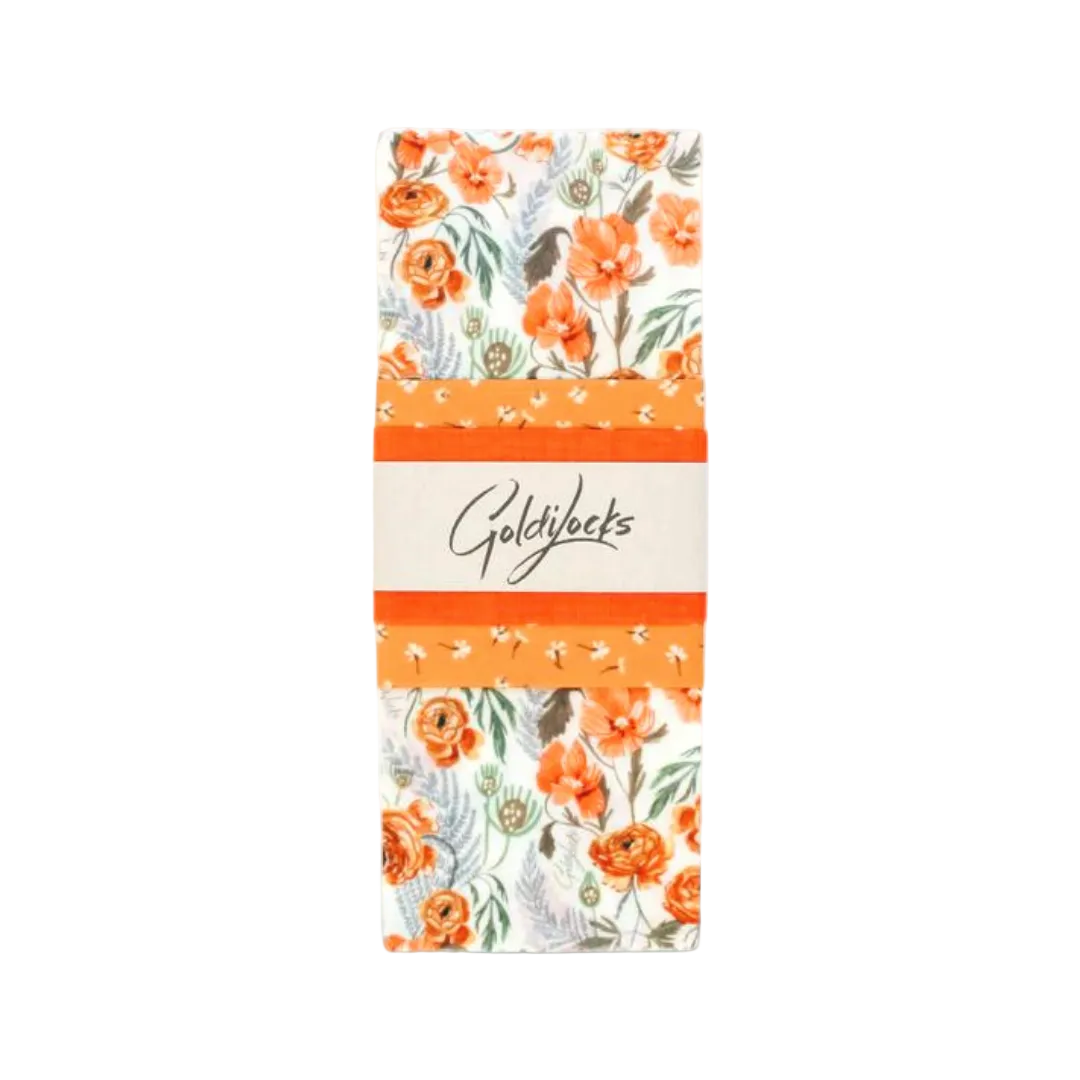 Floral-patterned product packaging with 'Goldylocks' branding on a light background